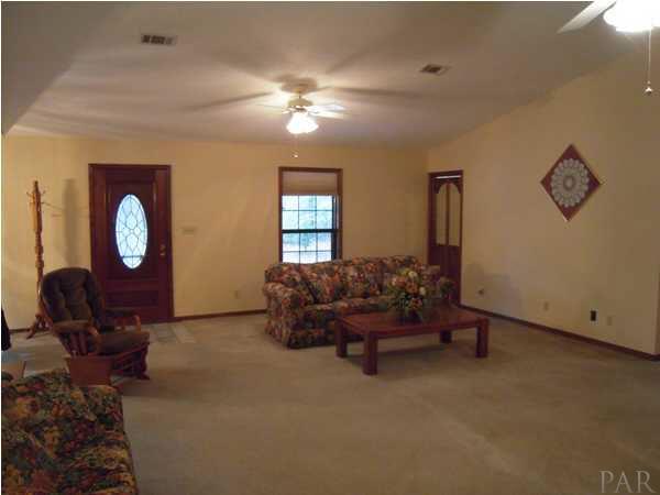 7732 Elrod Road Milton, FL 32583 - Photo 2 of 17 Entry into Living Room