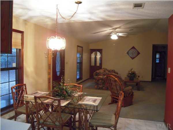 7732 Elrod Road Milton, FL 32583 - Photo 4 of 17 Dining Room Looking into Living Room