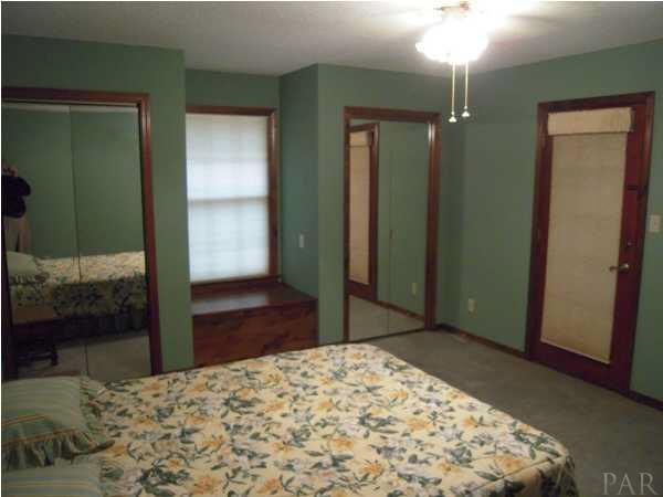 7732 Elrod Road Milton, FL 32583 - Photo 7 of 17 Master Bedroom