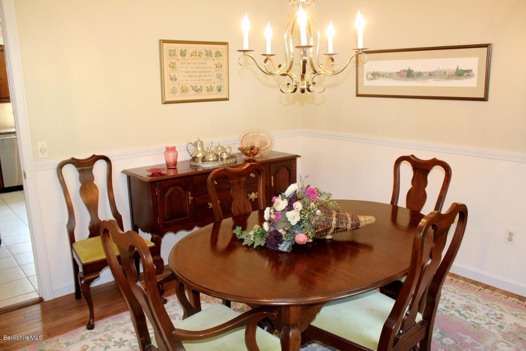 125 Dublin Road Richmond, MA 01201 - Photo 13 of 38 a view of a dining room with furniture and wooden floor