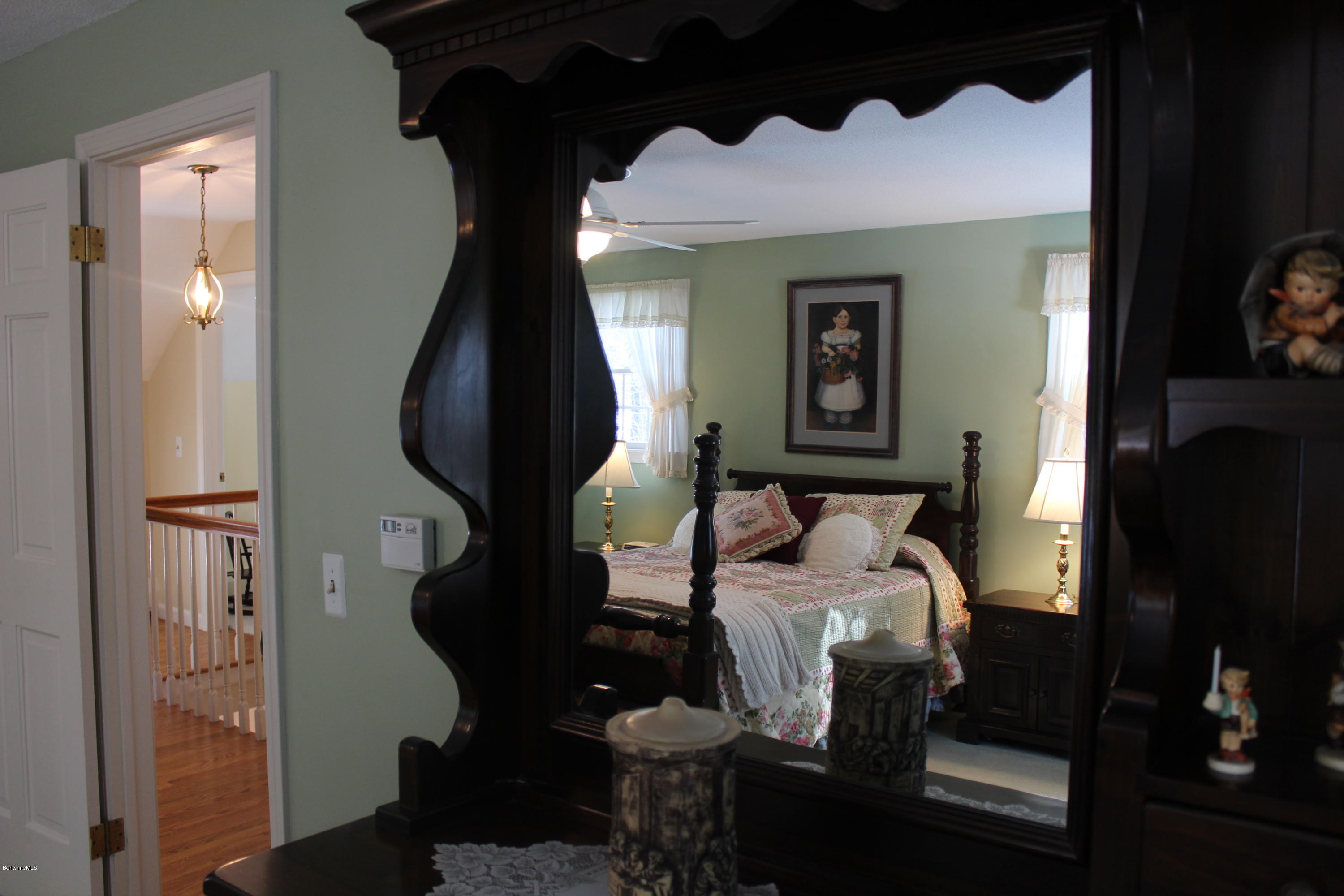 125 Dublin Road Richmond, MA 01201 - Photo 15 of 38 a bed room with a bed and a painting on the wall