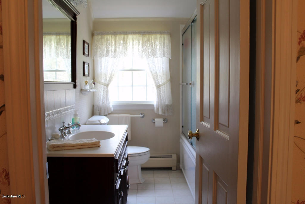 125 Dublin Road Richmond, MA 01201 - Photo 21 of 38 a bathroom with a sink a toilet and tub