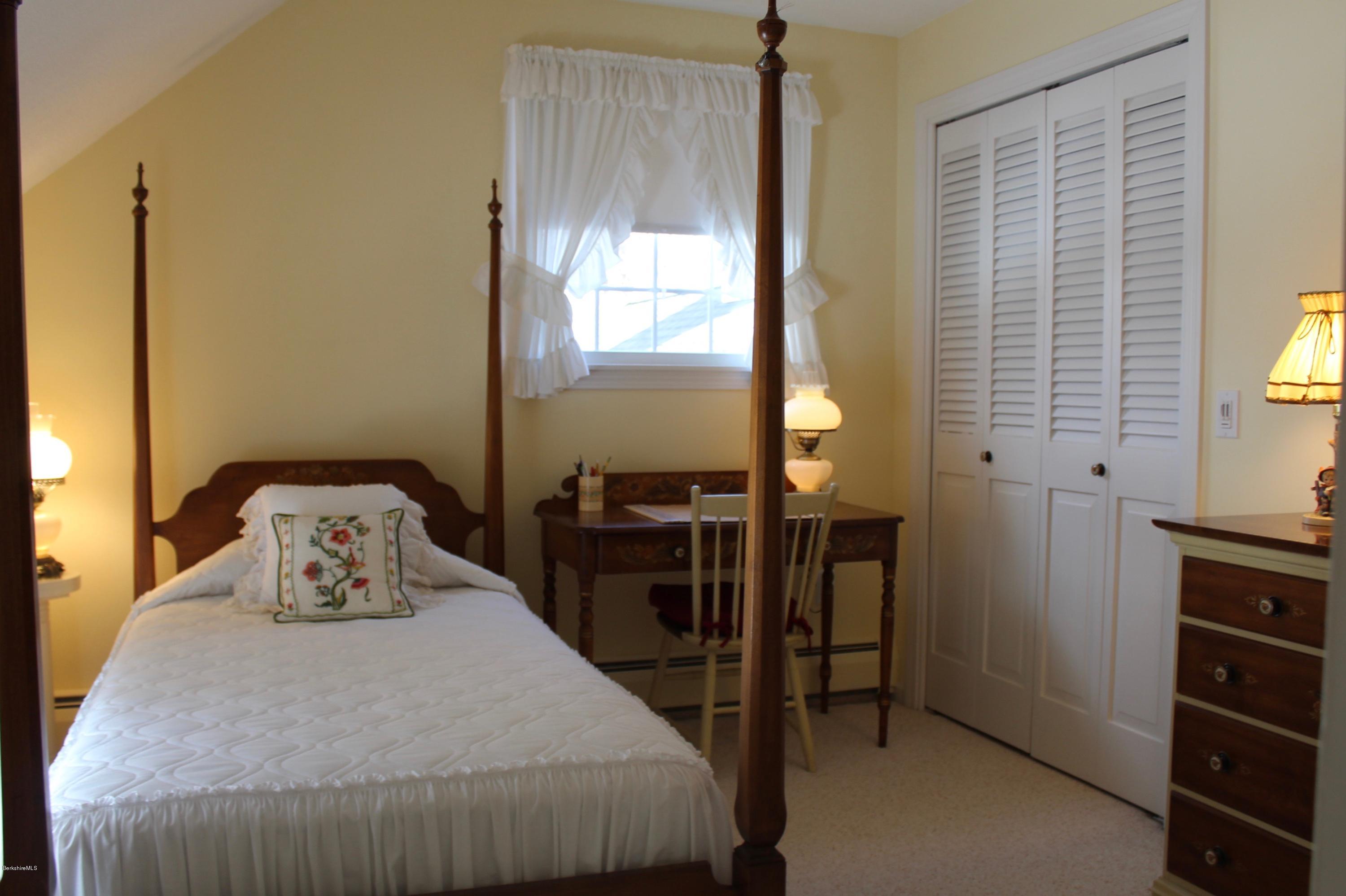 125 Dublin Road Richmond, MA 01201 - Photo 23 of 38 a bedroom with a bed and wooden floor