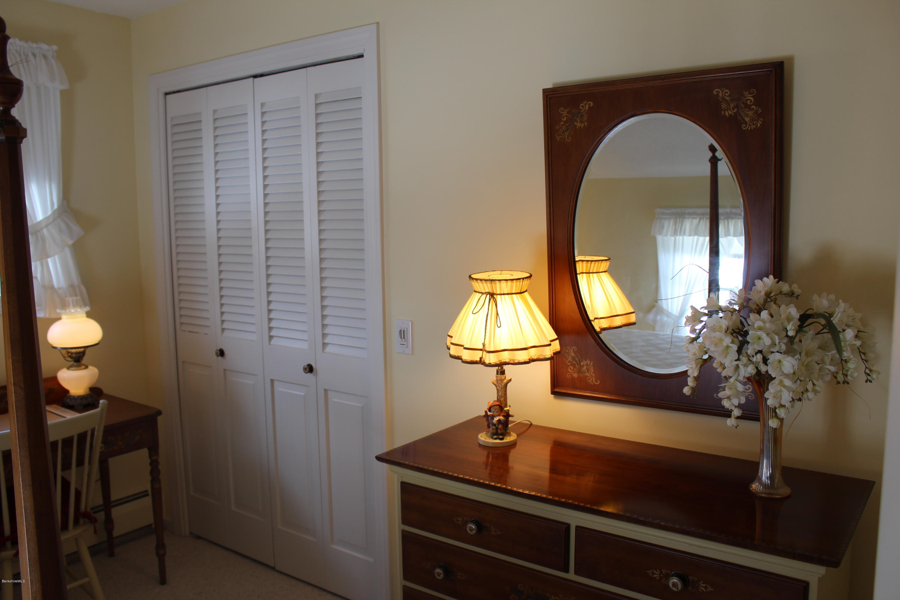 125 Dublin Road Richmond, MA 01201 - Photo 25 of 38 a view of a bathroom with a sink and mirror
