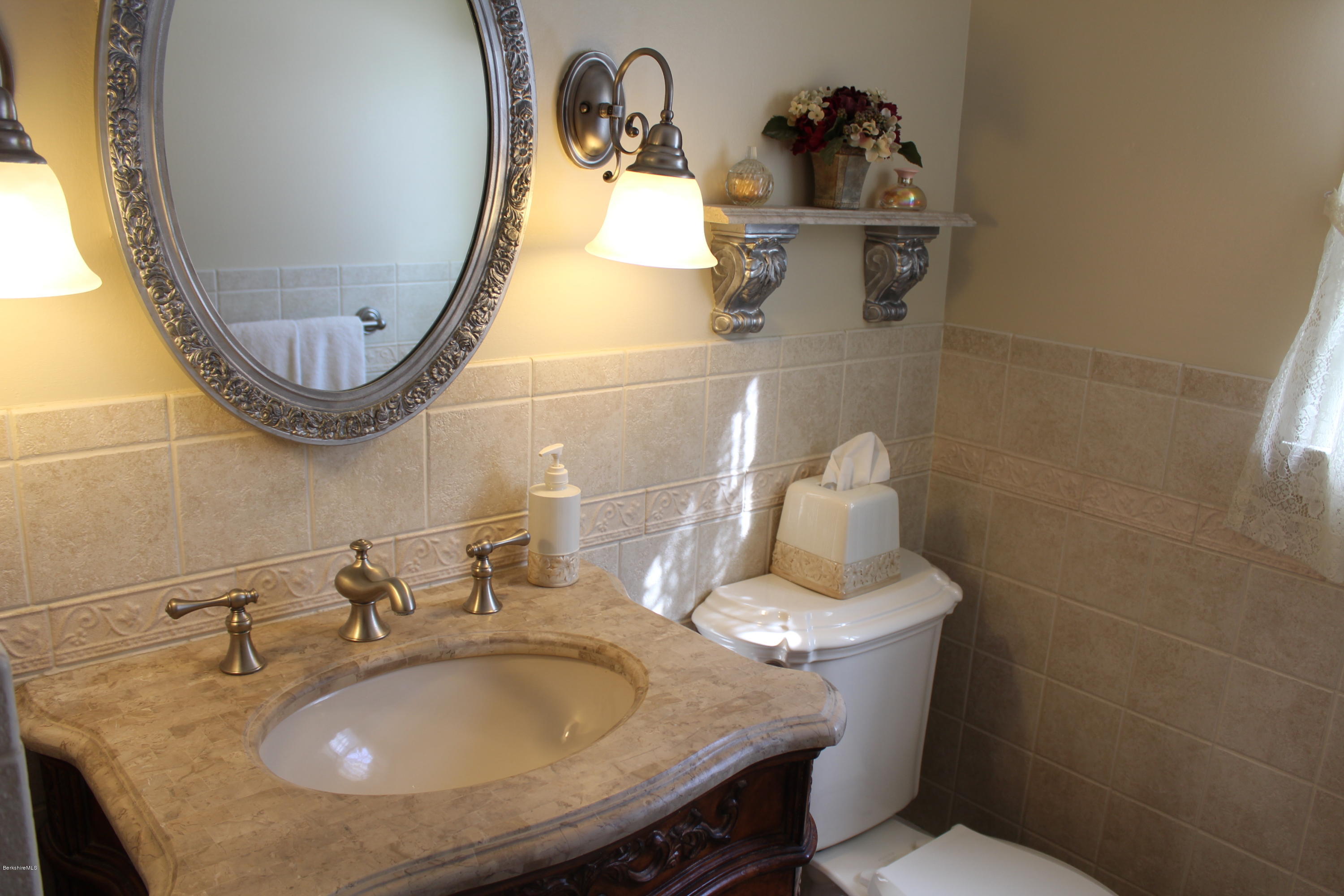 125 Dublin Road Richmond, MA 01201 - Photo 31 of 38 a bathroom with a sink mirror and toilet