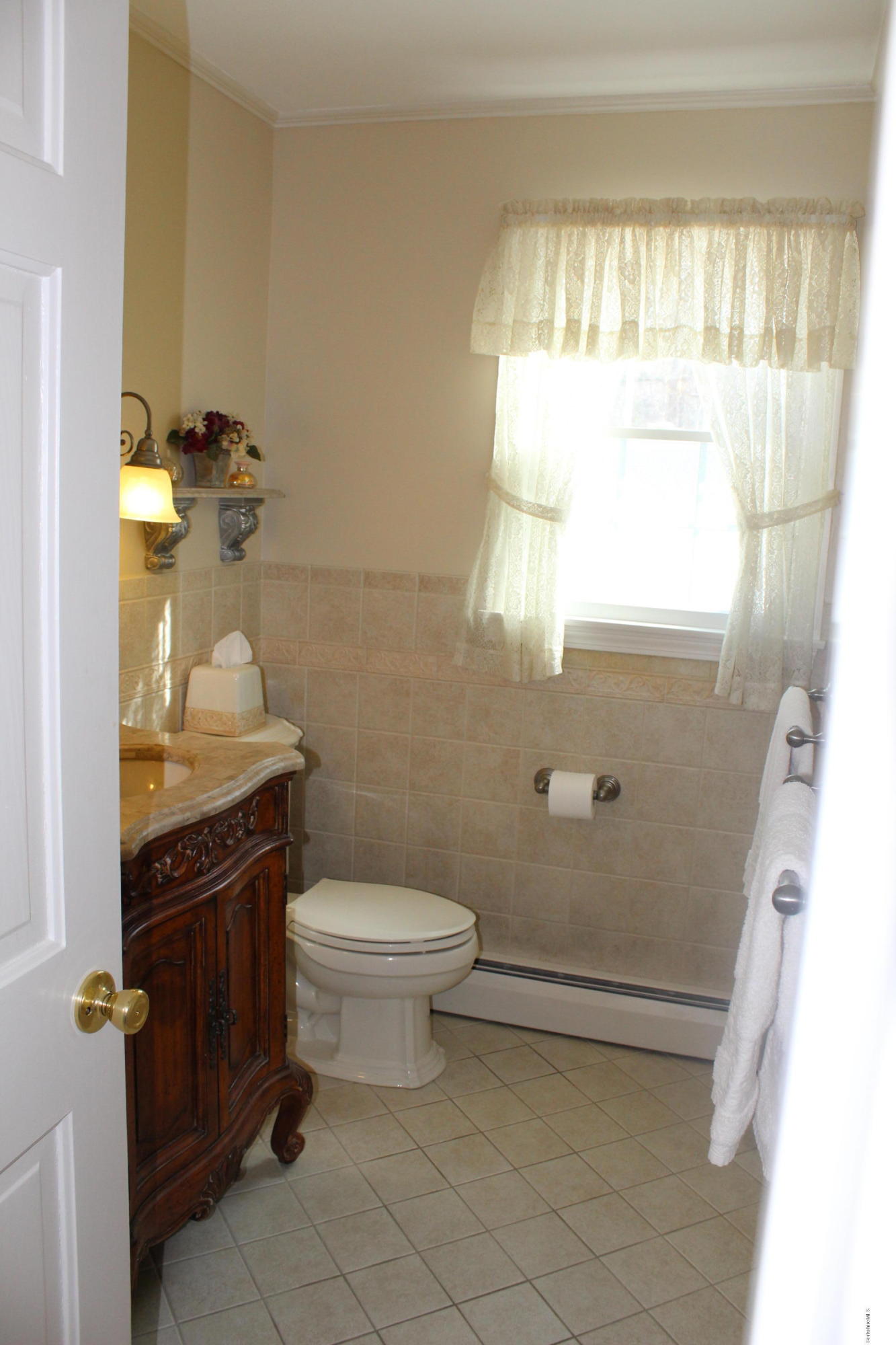 125 Dublin Road Richmond, MA 01201 - Photo 32 of 38 a bathroom with a sink toilet and window