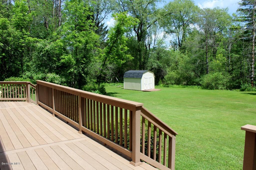 125 Dublin Road Richmond, MA 01201 - Photo 37 of 38 a balcony with wooden floor and yard in the back