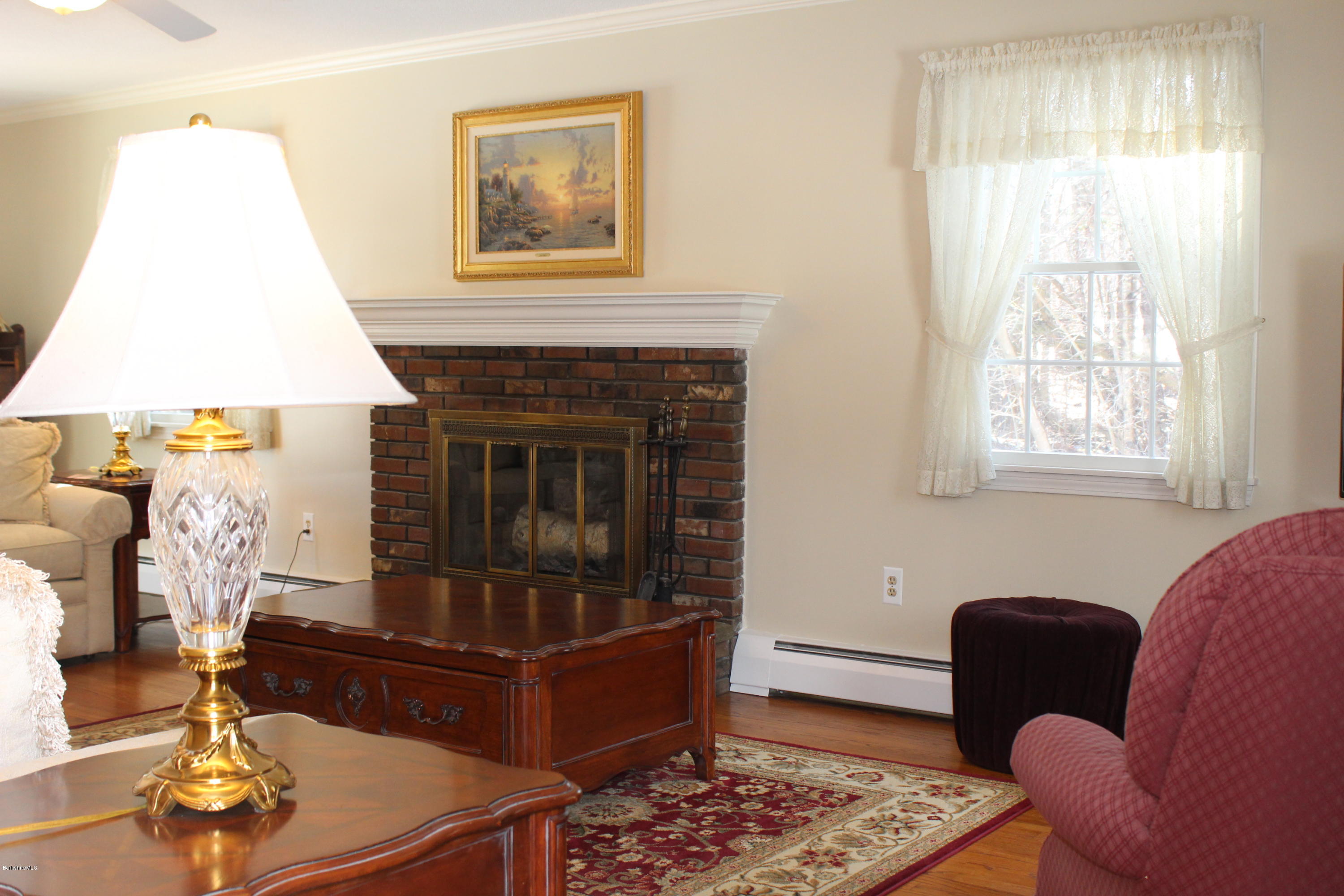 125 Dublin Road Richmond, MA 01201 - Photo 6 of 38 a living room with furniture and a fireplace