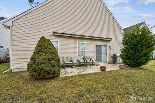 a front view of a house with patio
