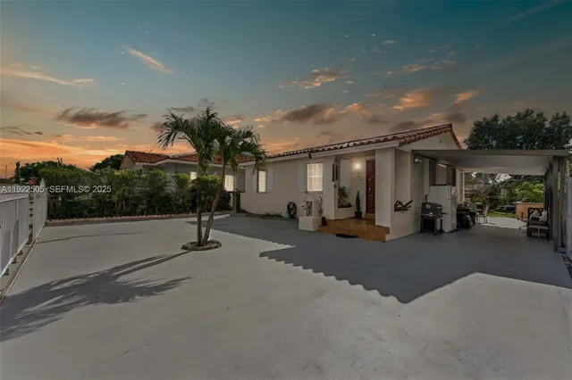 a view of a street with cars