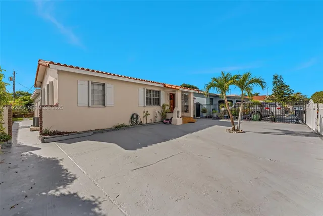 a view of a street with cars