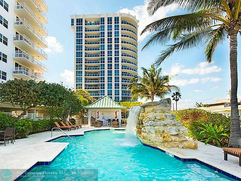 801 Briny Avenue, Unit 605 Pompano Beach, FL 33062 - Photo 15 of 16 Pool. Lounge by pool and ocean.