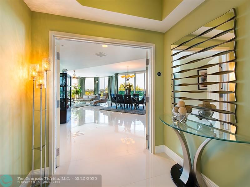 801 Briny Avenue, Unit 605 Pompano Beach, FL 33062 - Photo 4 of 16 Foyer into private elevator