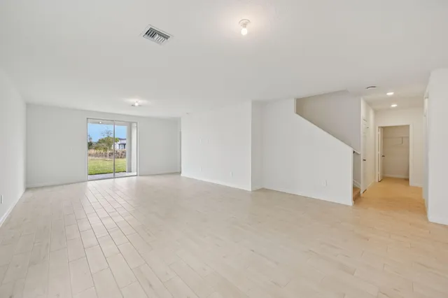 a view of a kitchen with a sink