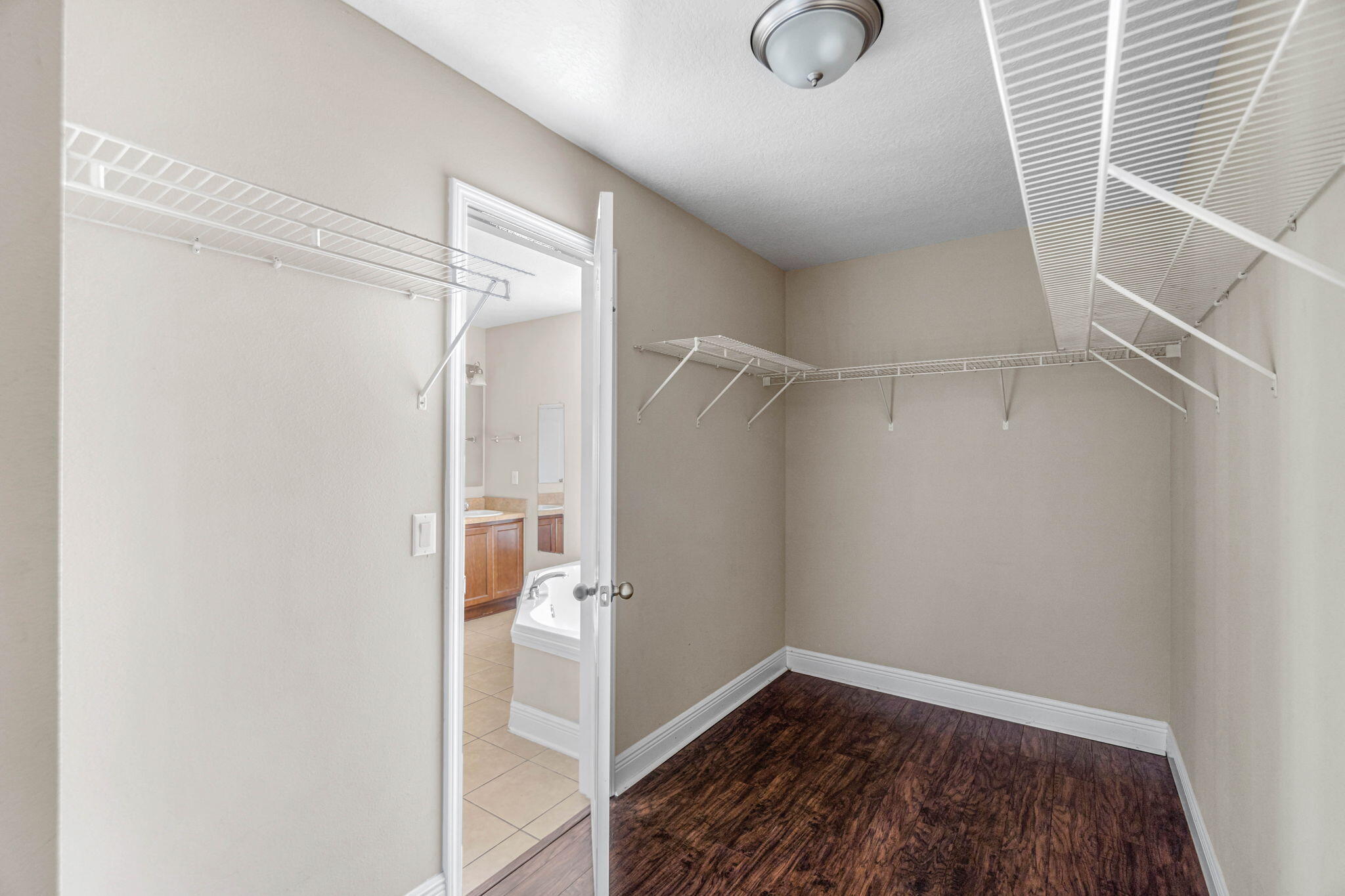 4561 Hermosa Road Crestview, FL 32539 - Photo 20 of 27 a view of walk in closet