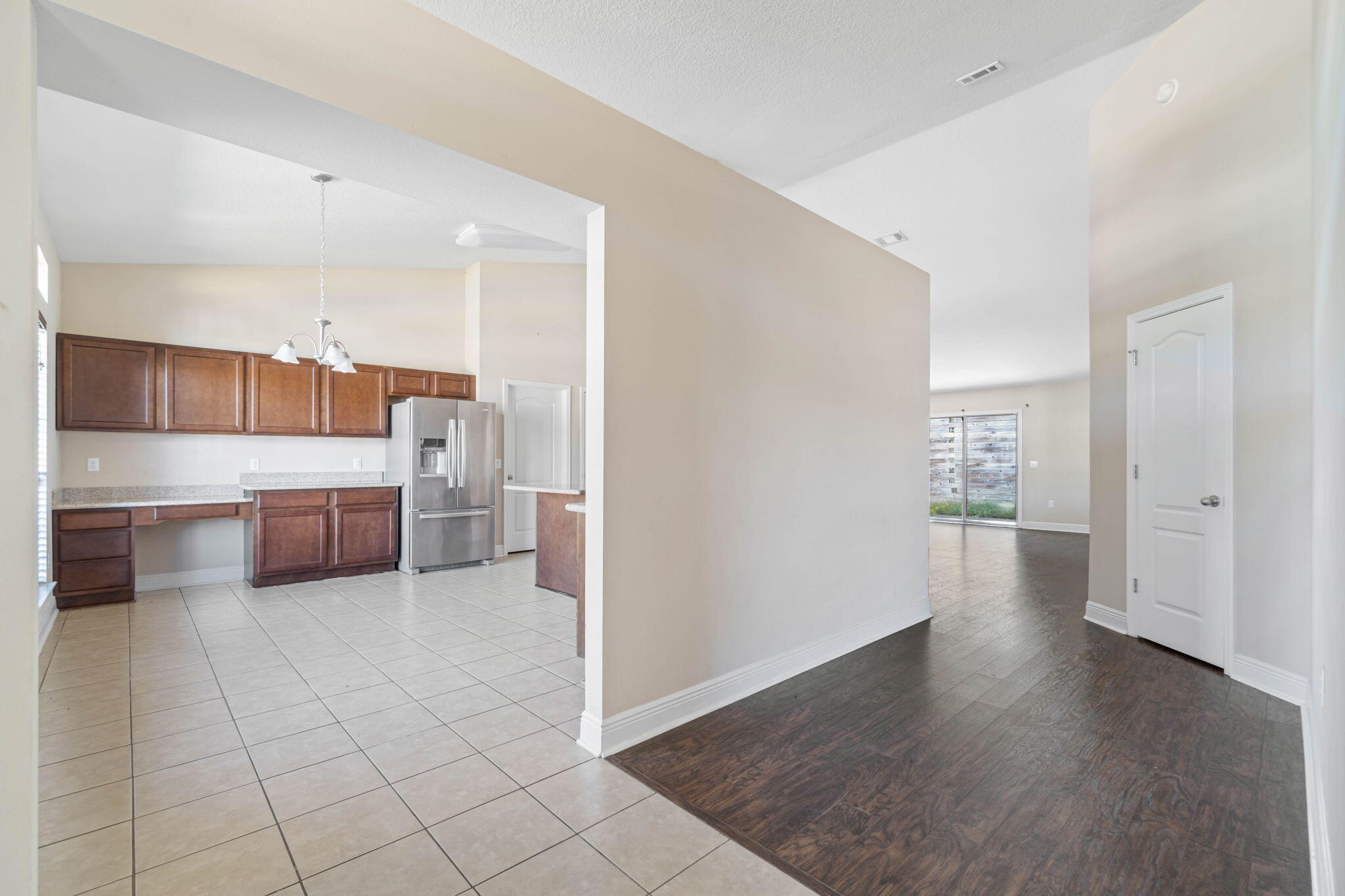 4561 Hermosa Road Crestview, FL 32539 - Photo 5 of 27 a view of a kitchen and an empty room