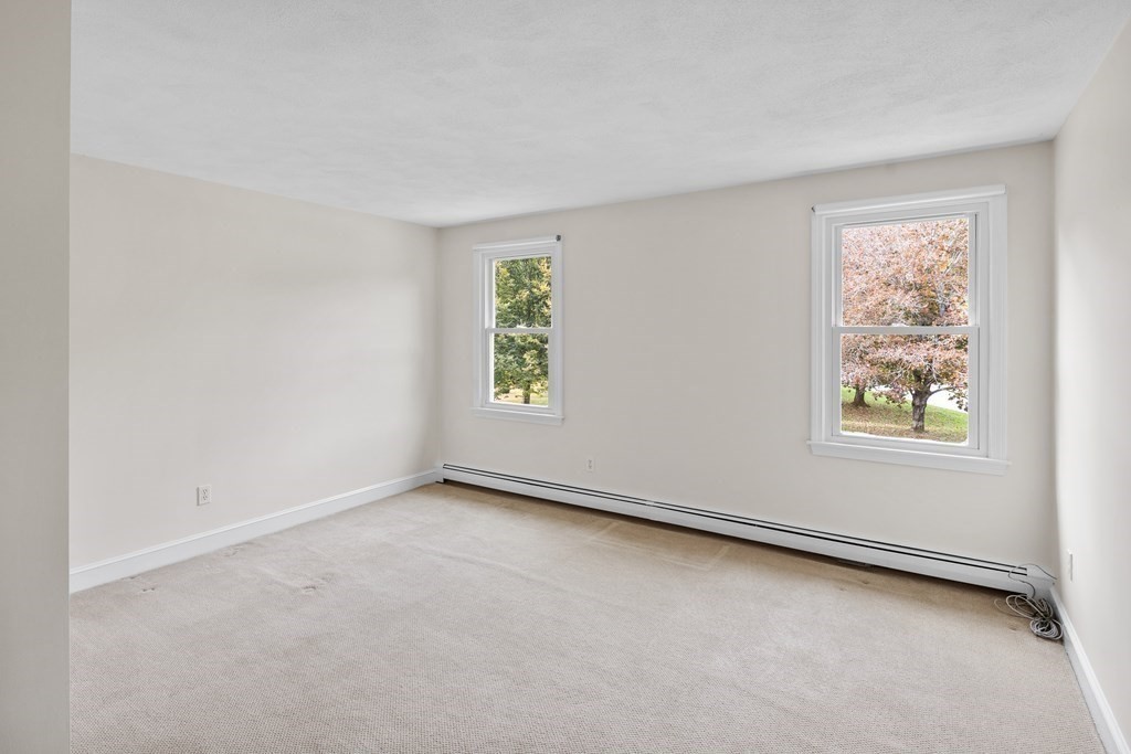56 Sherburne Road South Lexington, MA 02421 - Photo 26 of 42 an empty room with windows