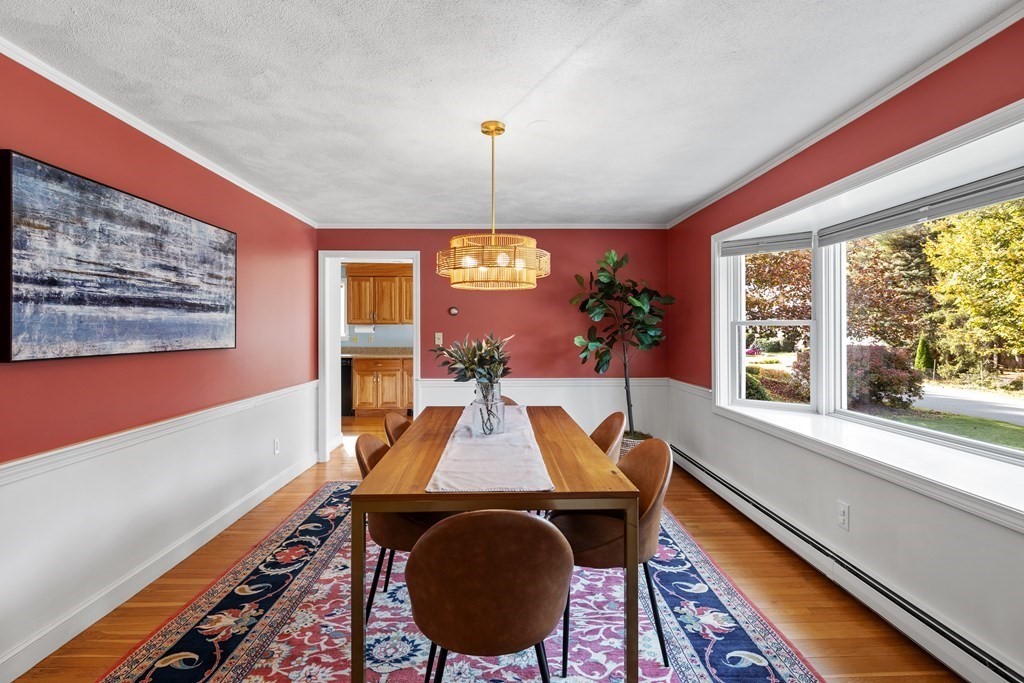 56 Sherburne Road South Lexington, MA 02421 - Photo 3 of 42 a view of a dining room with furniture window and wooden floor
