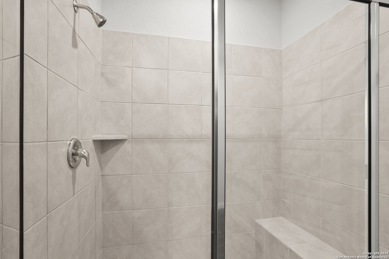 13636 Helton Pass St. Hedwig, TX 78152 - Photo 14 of 34 a bathroom with a shower