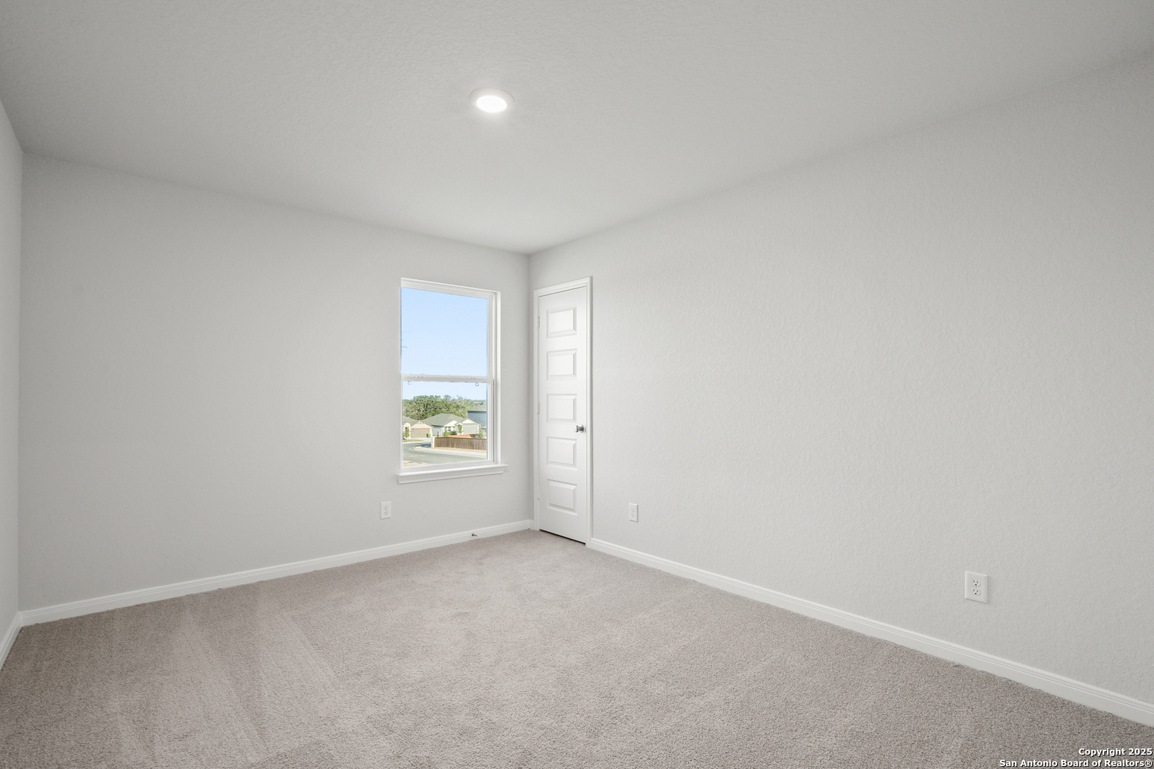 13636 Helton Pass St. Hedwig, TX 78152 - Photo 17 of 34 an empty room with windows