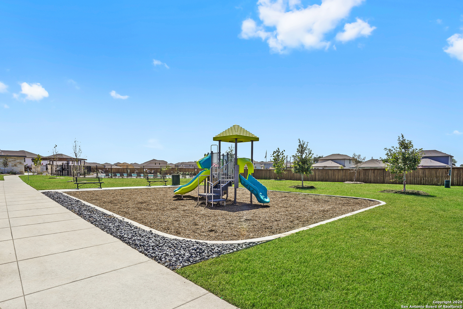 13636 Helton Pass St. Hedwig, TX 78152 - Photo 34 of 34 a view of outdoor space with playground and green space