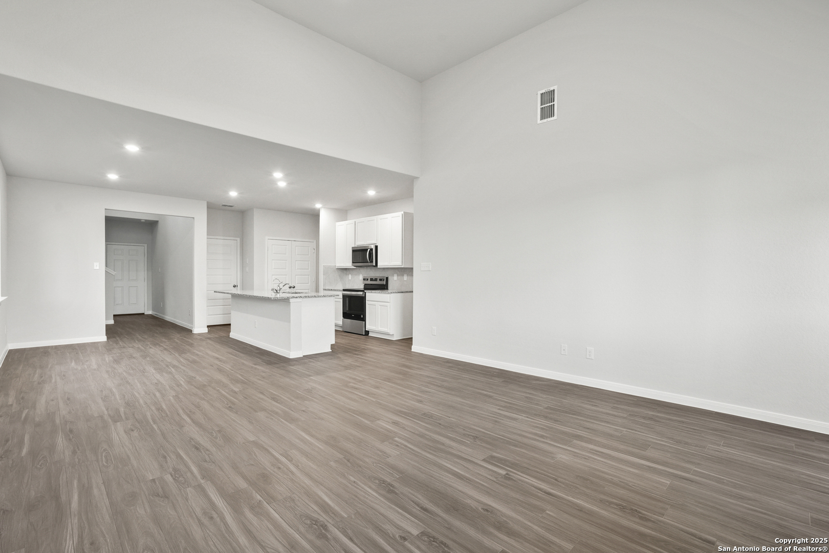 13636 Helton Pass St. Hedwig, TX 78152 - Photo 7 of 34 a view of kitchen with wooden floor