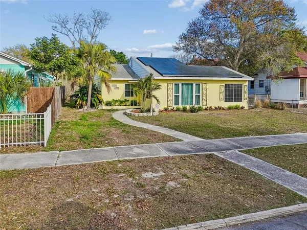 a front view of house with yard