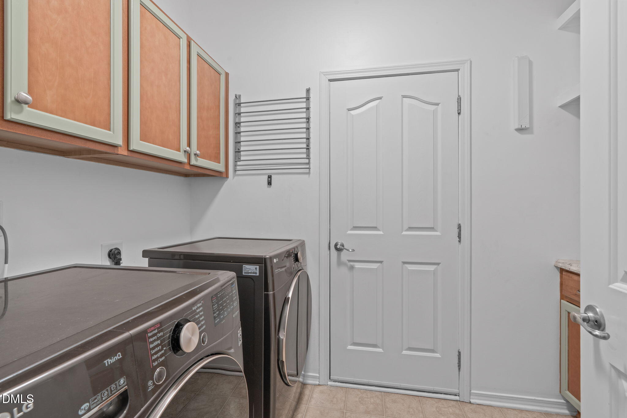 124 Daneborg Road Durham, NC 27703 - Photo 33 of 40 a utility room with dryer and washer