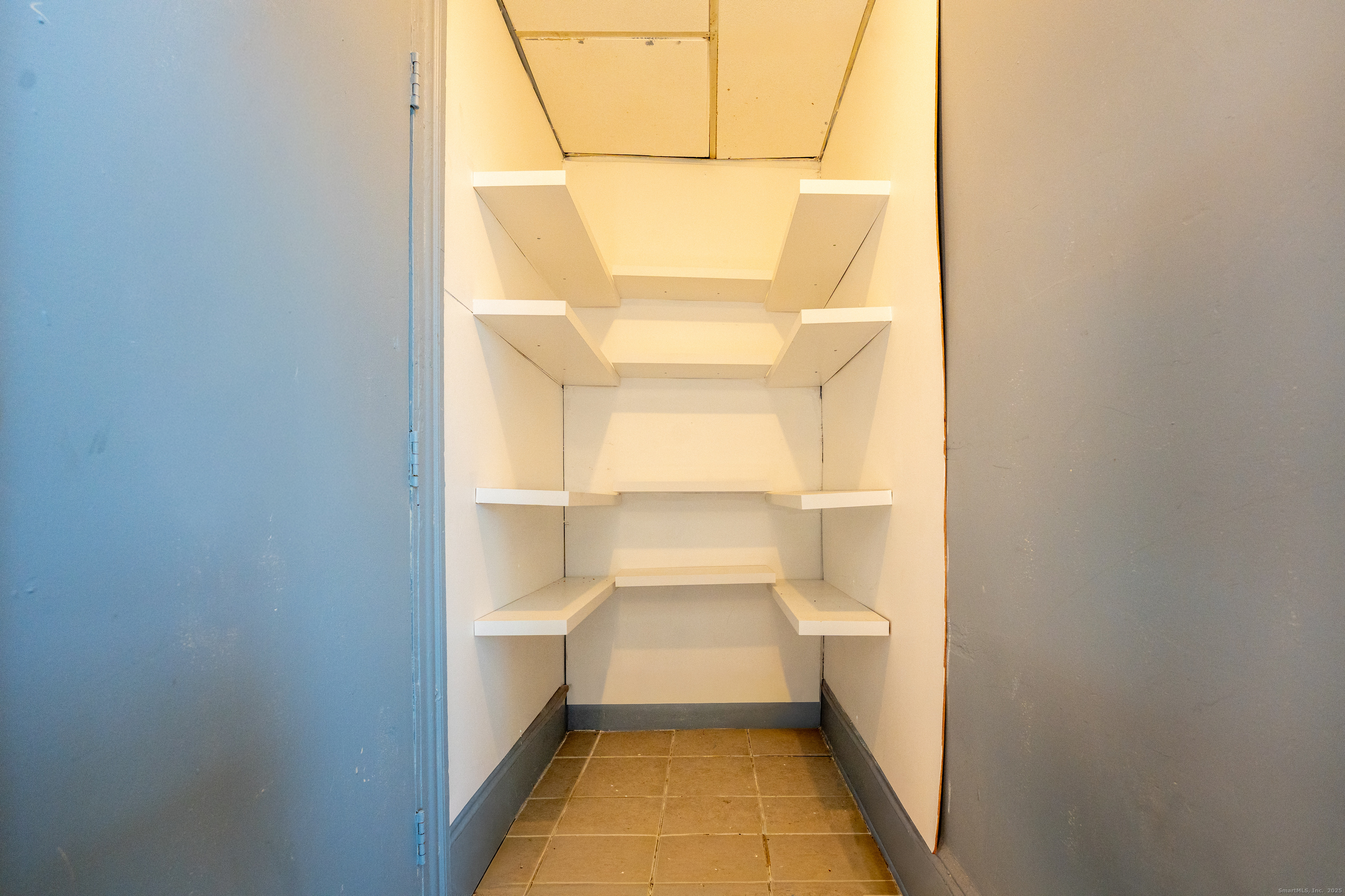 1368 East Main Street, Unit 4 Bridgeport, CT 06608 - Photo 12 of 14 a walk in closet with a window