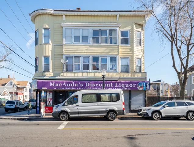 a car parked in front of a building