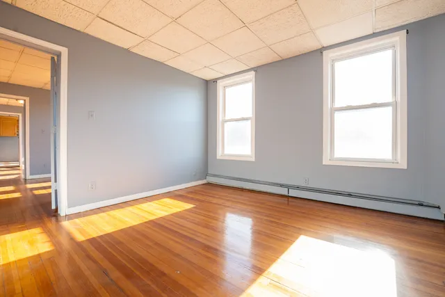 a view of an empty room and window