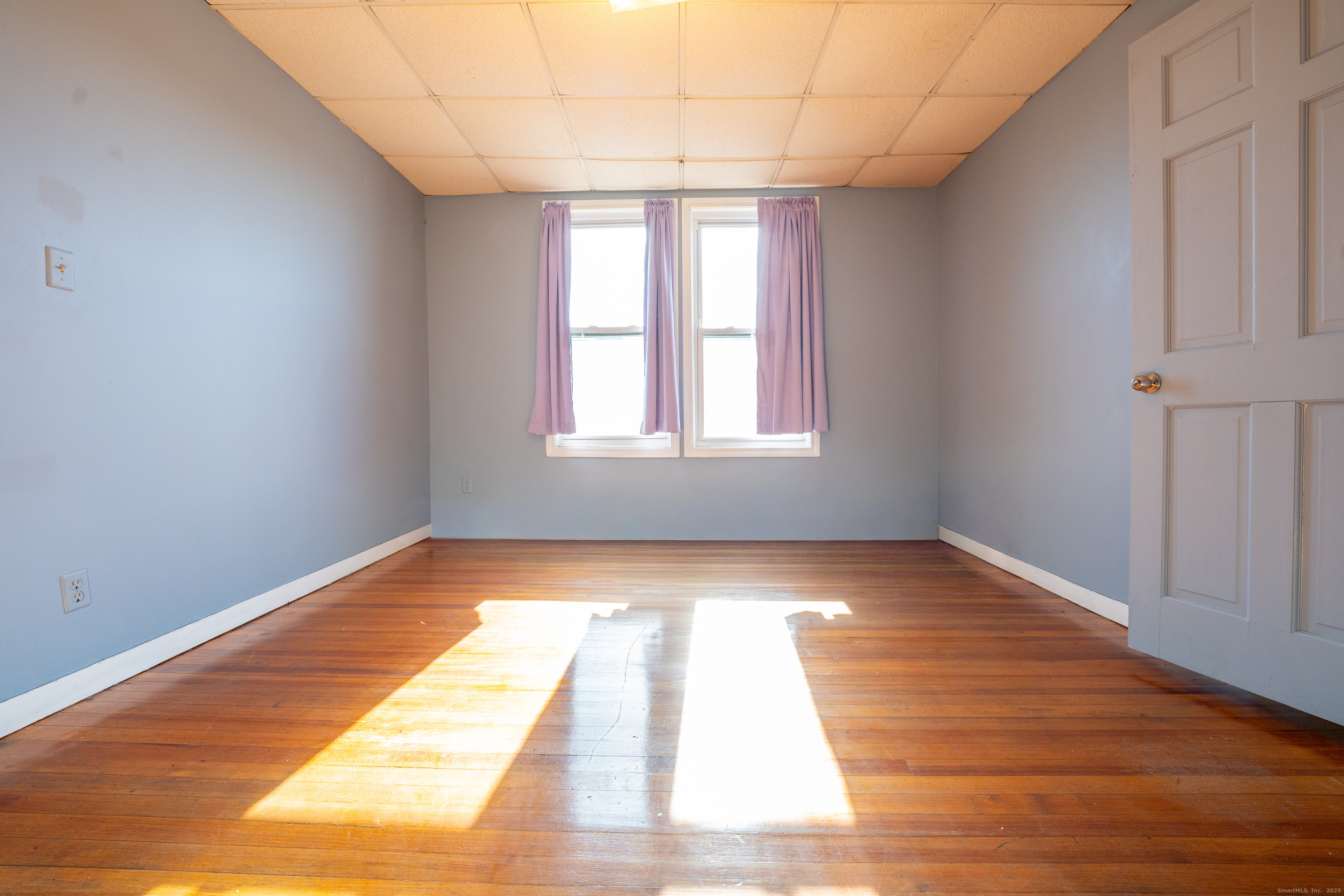 1368 East Main Street, Unit 4 Bridgeport, CT 06608 - Photo 7 of 14 a view of an empty room and window
