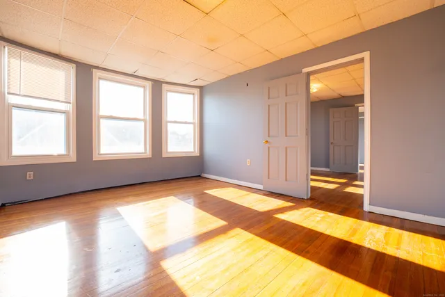 a view of an empty room and window