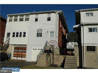 1024 Fern Avenue Reading, PA 19607 - Photo 3 of 12 a view of a house with many windows