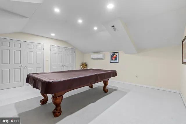 a room with pool table