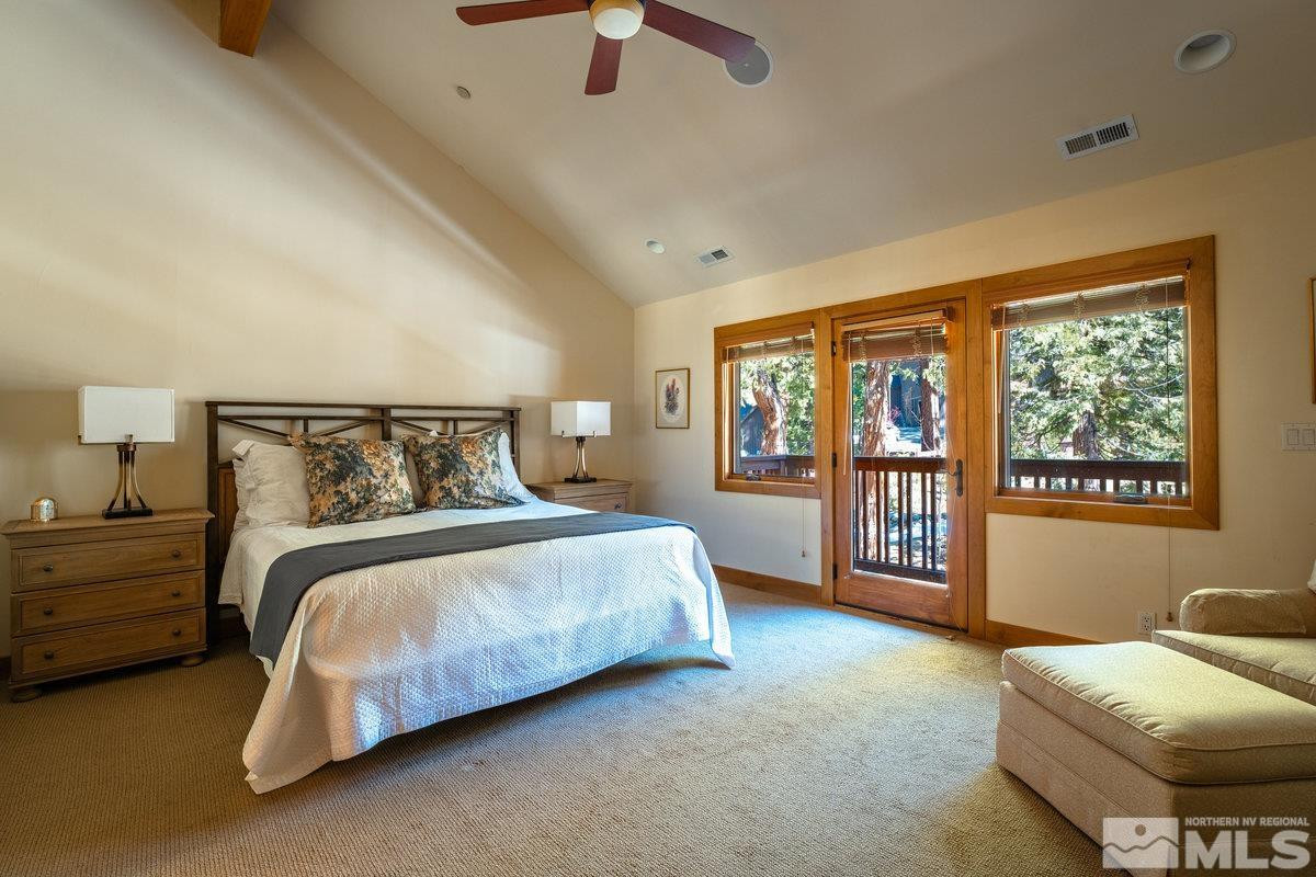 2147 The Back Road Glenbrook, NV 89413 - Photo 19 of 40 a bedroom with a bed and glass window