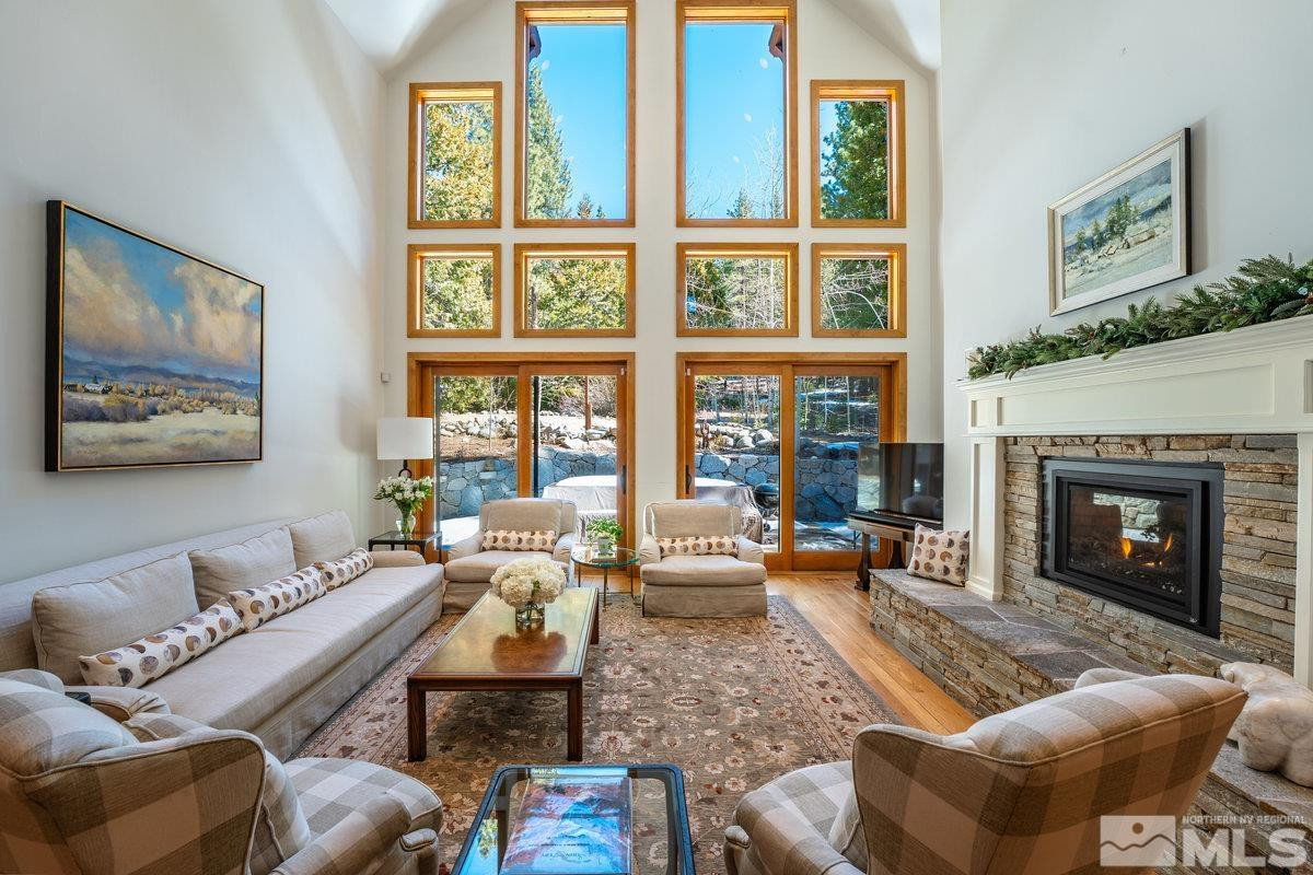 2147 The Back Road Glenbrook, NV 89413 - Photo 5 of 40 a living room with furniture large window and fireplace