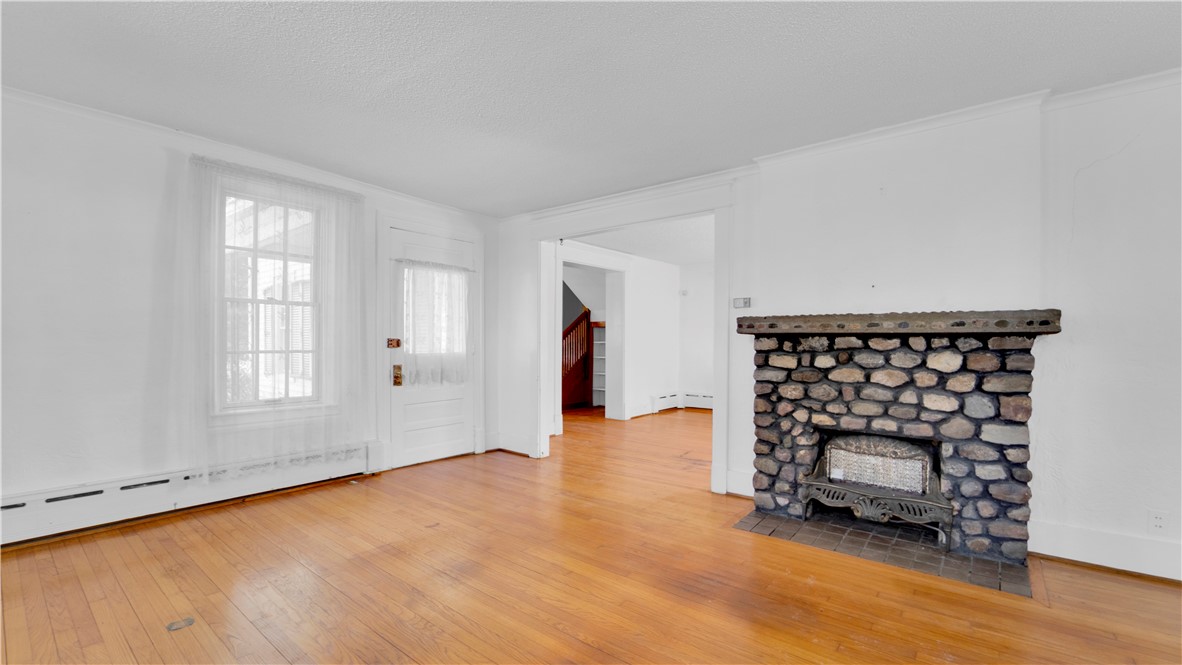150 William Kidder Road Lancaster, NY 14086 - Photo 15 of 39 The 12' x 19' Living Room, highlighting the open f
