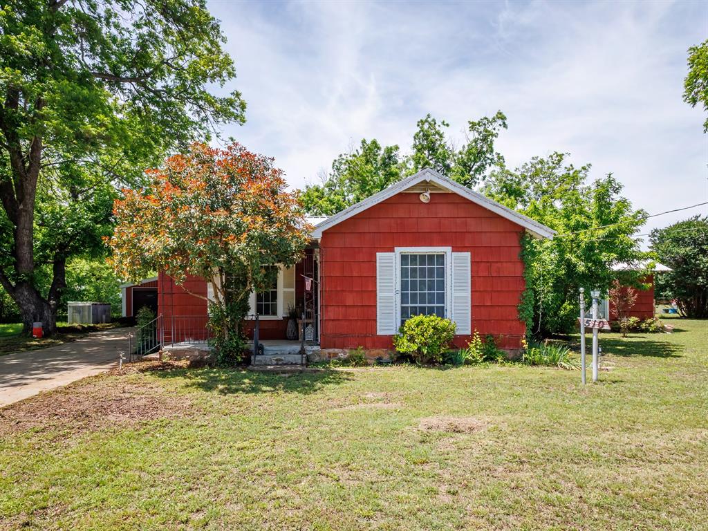 510 South Main Street Rising Star, TX 76471 - Photo 1 of 40 a front view of a house with garden
