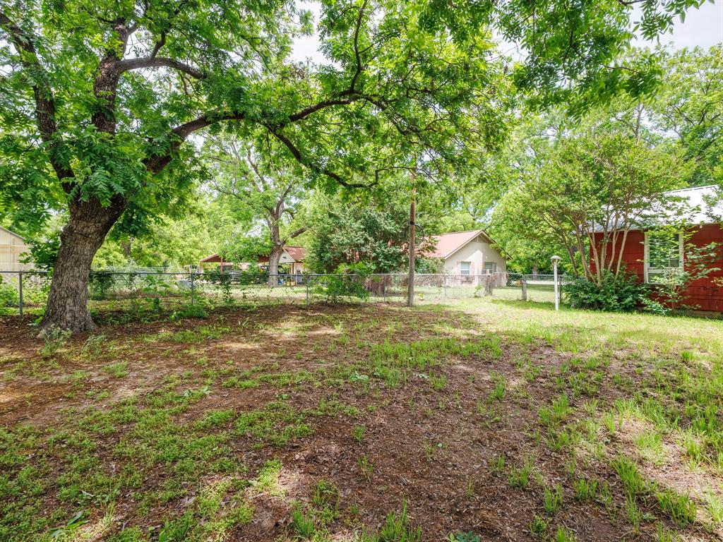 510 South Main Street Rising Star, TX 76471 - Photo 20 of 40 a view of backyard with green space