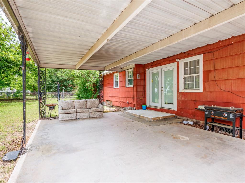 510 South Main Street Rising Star, TX 76471 - Photo 22 of 40 a backyard of a house with outdoor seating