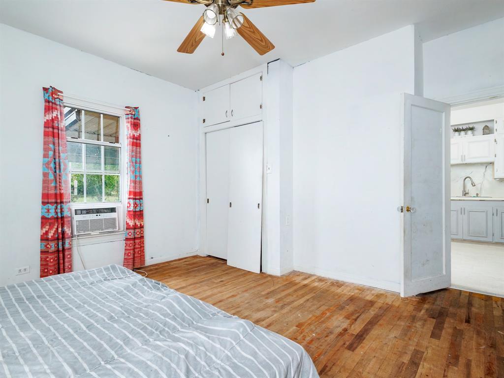 510 South Main Street Rising Star, TX 76471 - Photo 36 of 40 a bedroom with a bed and a closet