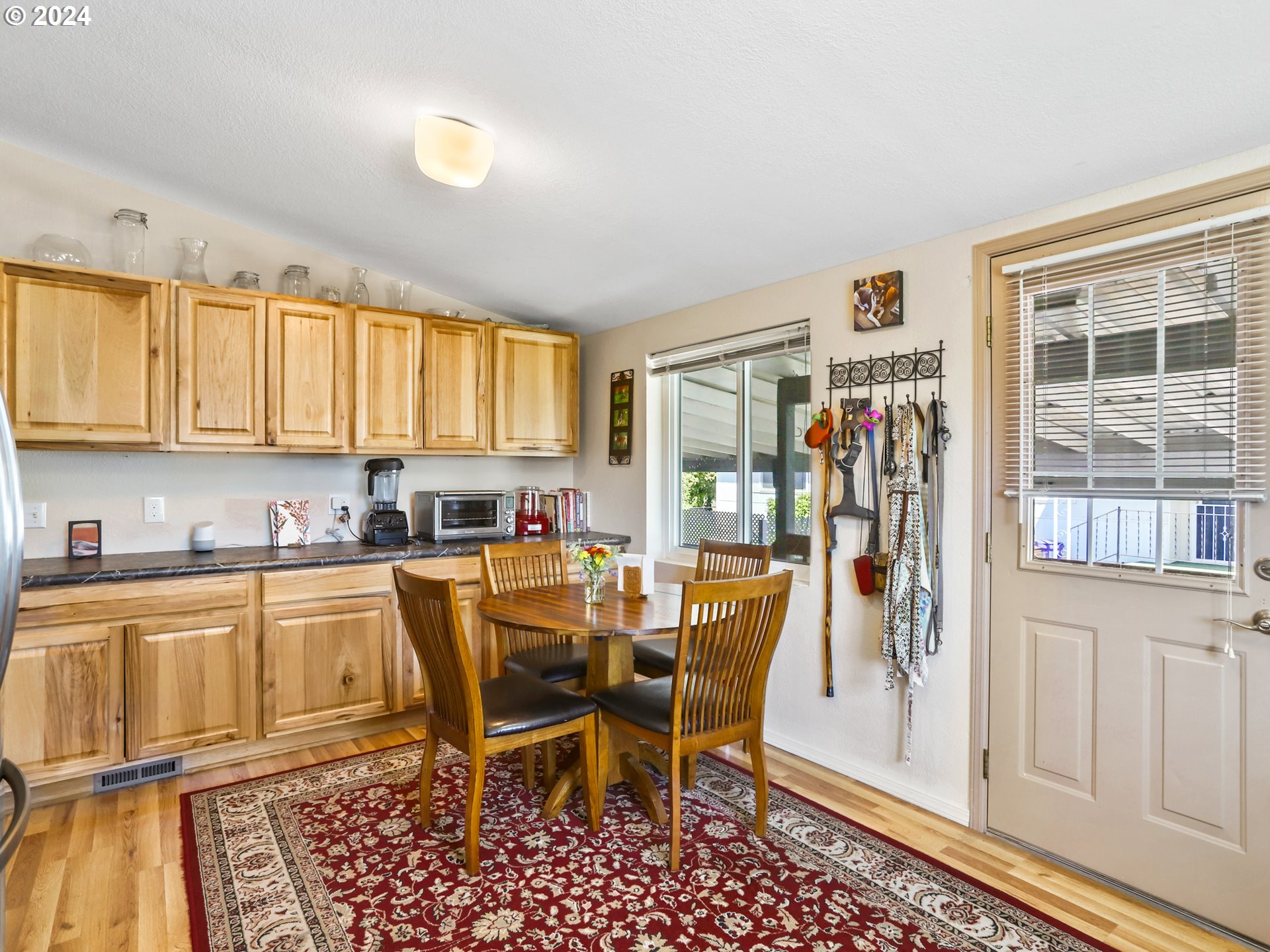 900 Northeast Francis Avenue Gresham, OR 97030 - Photo 10 of 16 a view of a dining room with furniture