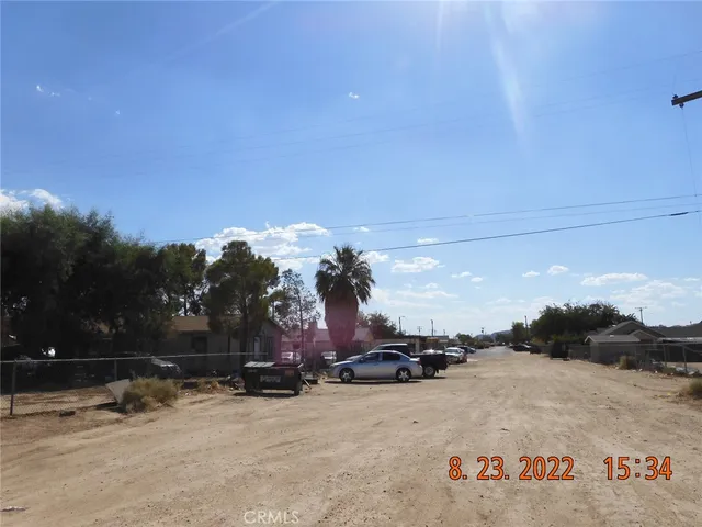 a view of a road with a building in the background