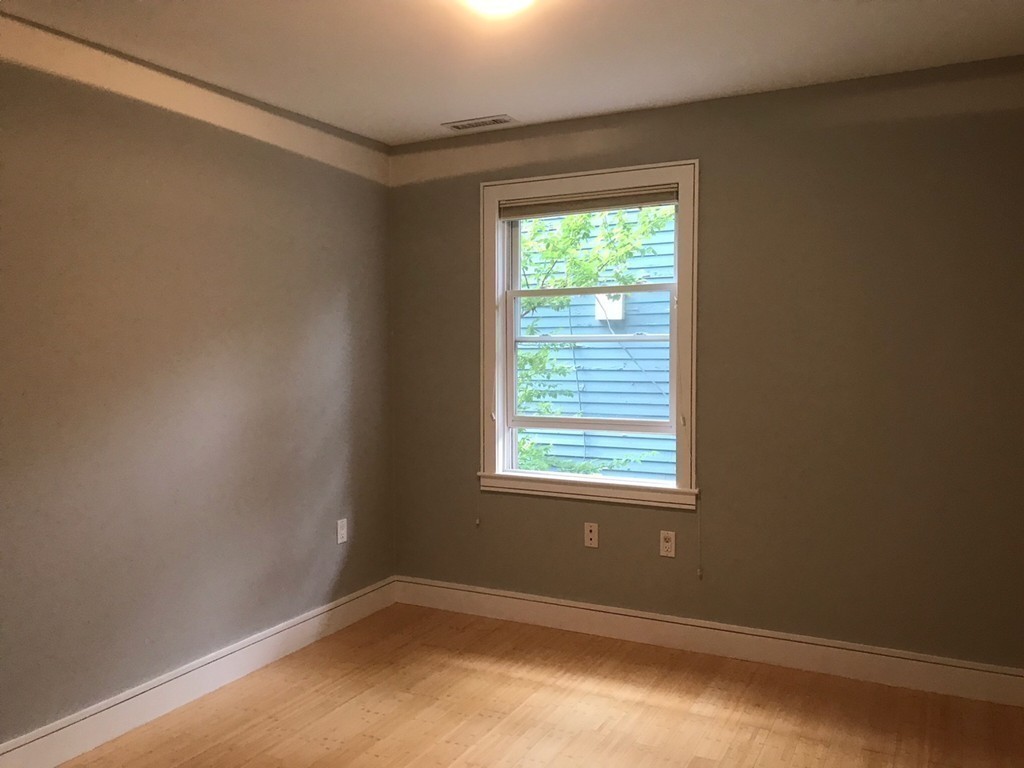 2 Boylston Street, Unit 3 Boston, MA 02130 - Photo 7 of 9 an empty room with a window