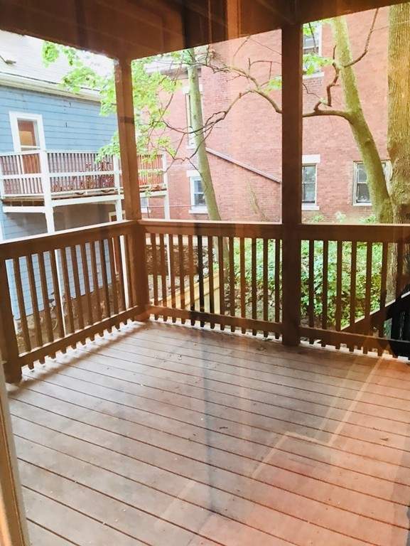 2 Boylston Street, Unit 3 Boston, MA 02130 - Photo 9 of 9 a view of wooden floor with a chair