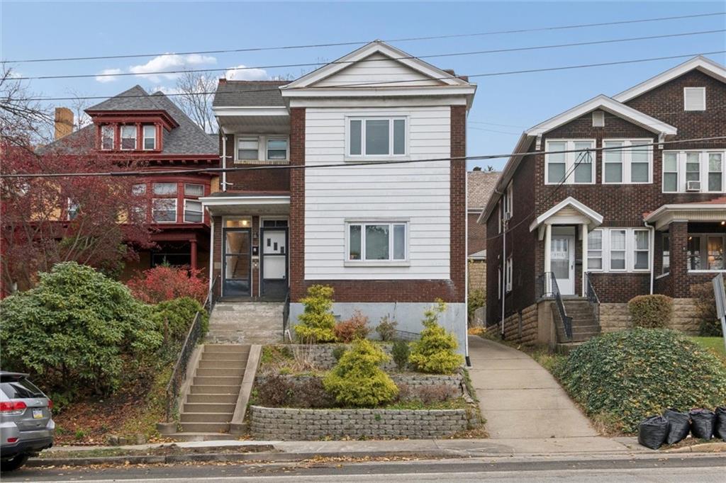 3518 Beechwood Boulevard Pittsburgh, PA 15217 - Photo 1 of 34 a front view of a house with garden