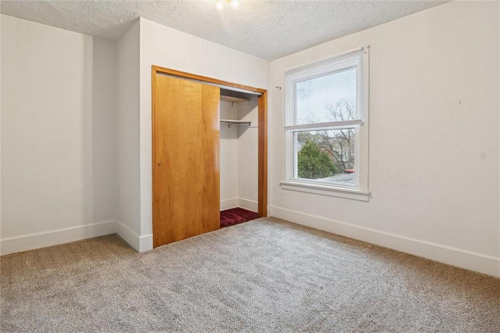 3518 Beechwood Boulevard Pittsburgh, PA 15217 - Photo 18 of 34 an empty room with windows and closet