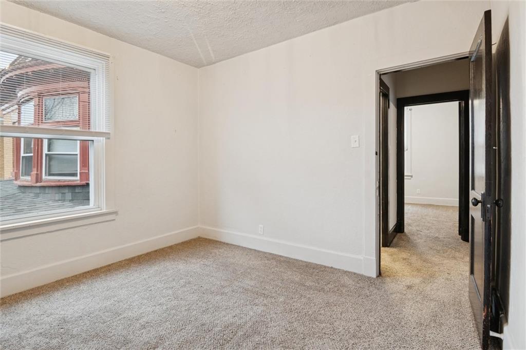 3518 Beechwood Boulevard Pittsburgh, PA 15217 - Photo 19 of 34 an empty room with windows and closet