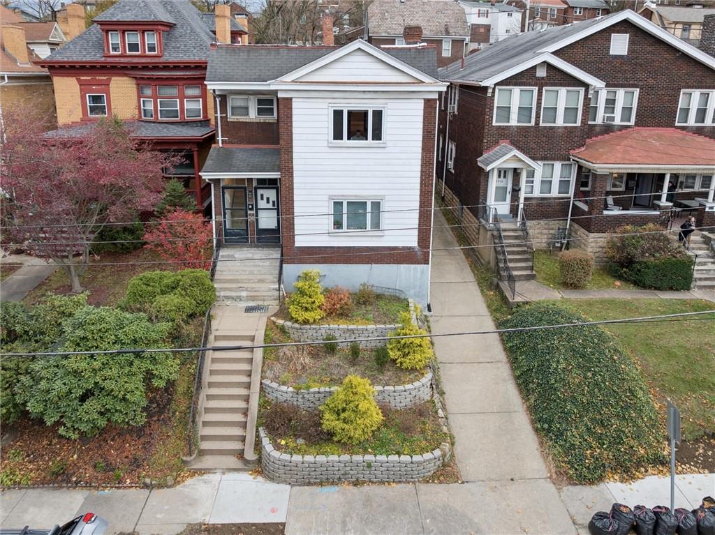 3518 Beechwood Boulevard Pittsburgh, PA 15217 - Photo 33 of 34 a front view of a house with garden